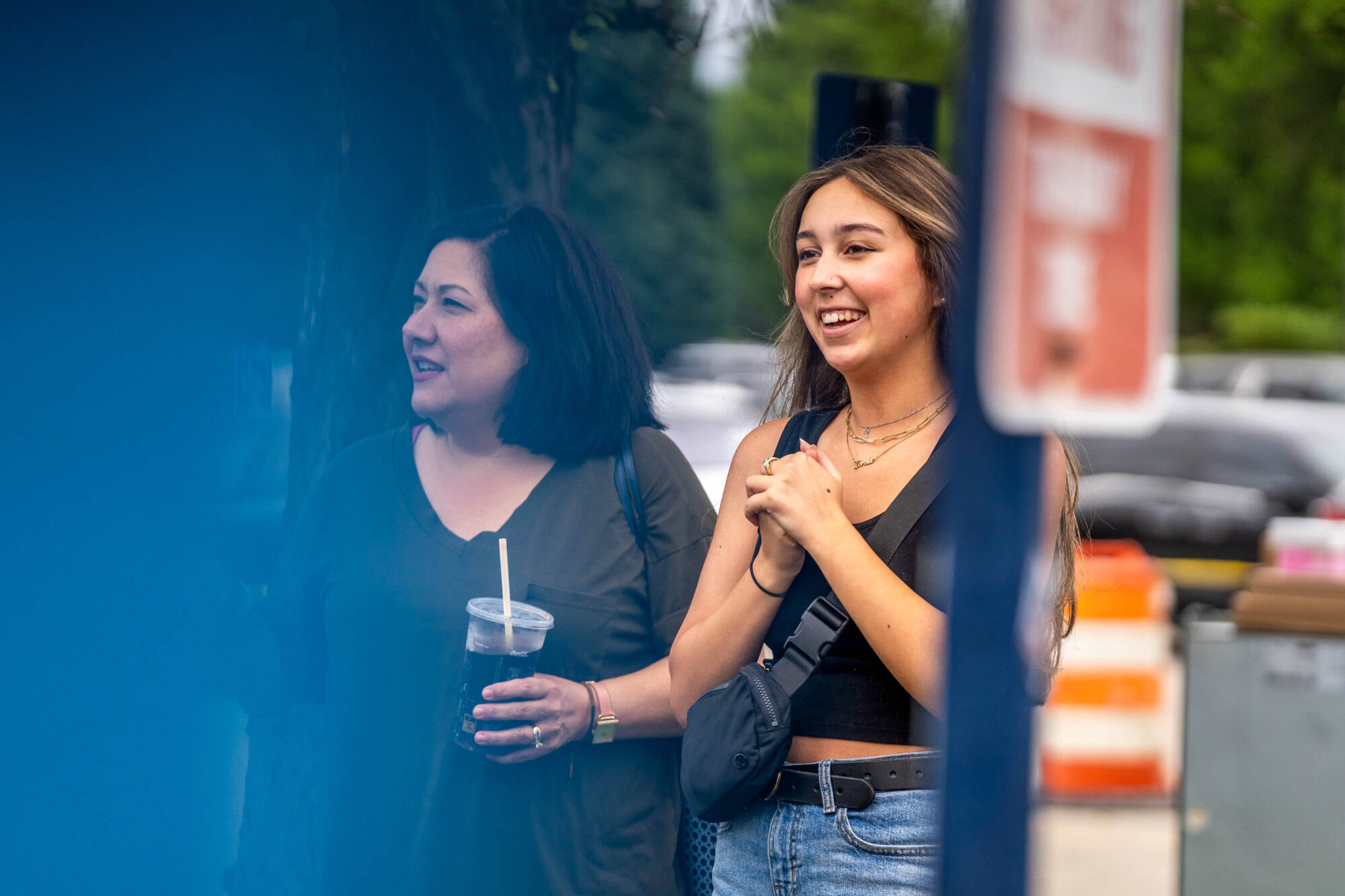 Incoming freshman, Lorelei Wohlfarth, laughing and smiling by her car on August 20th.